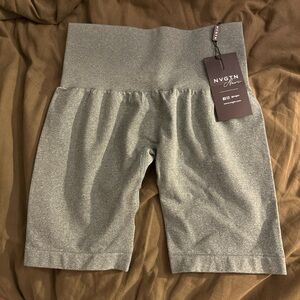 NWT size XS green NVGTN biker shorts